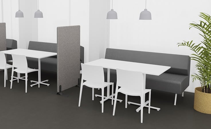 A 3D drawing of a canteen featuring withe tables and chairs and grey sofas and acoustic panels