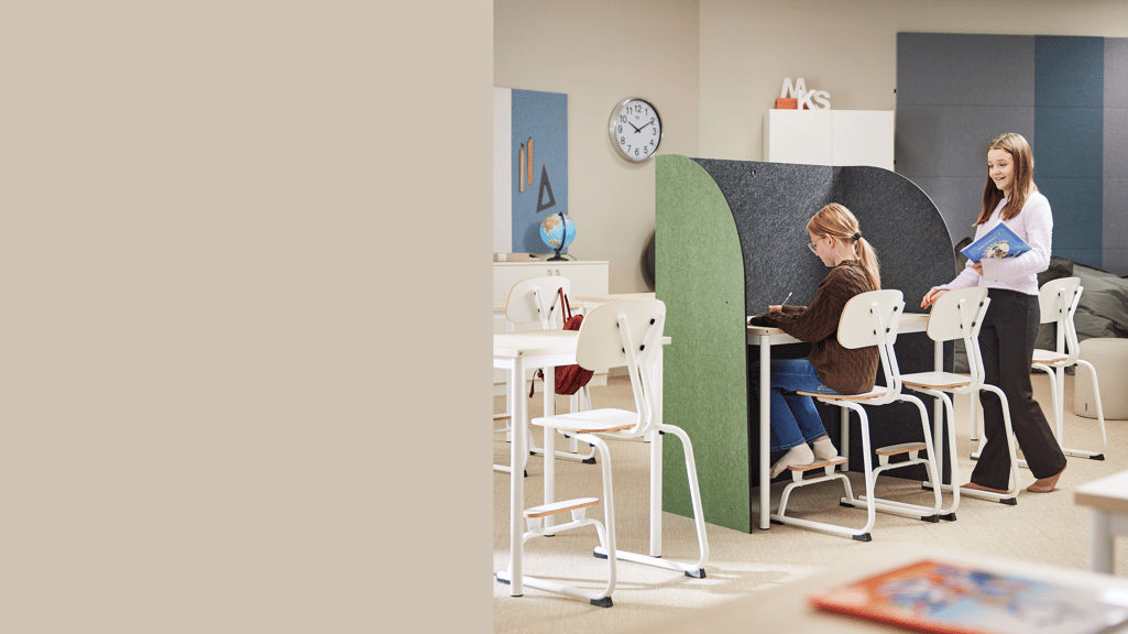 sensory classroom furniture, teacher with student at desk