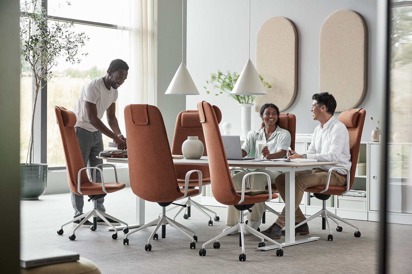 calm conference room space with ergonomic chairs, good lighting and acoustic panels