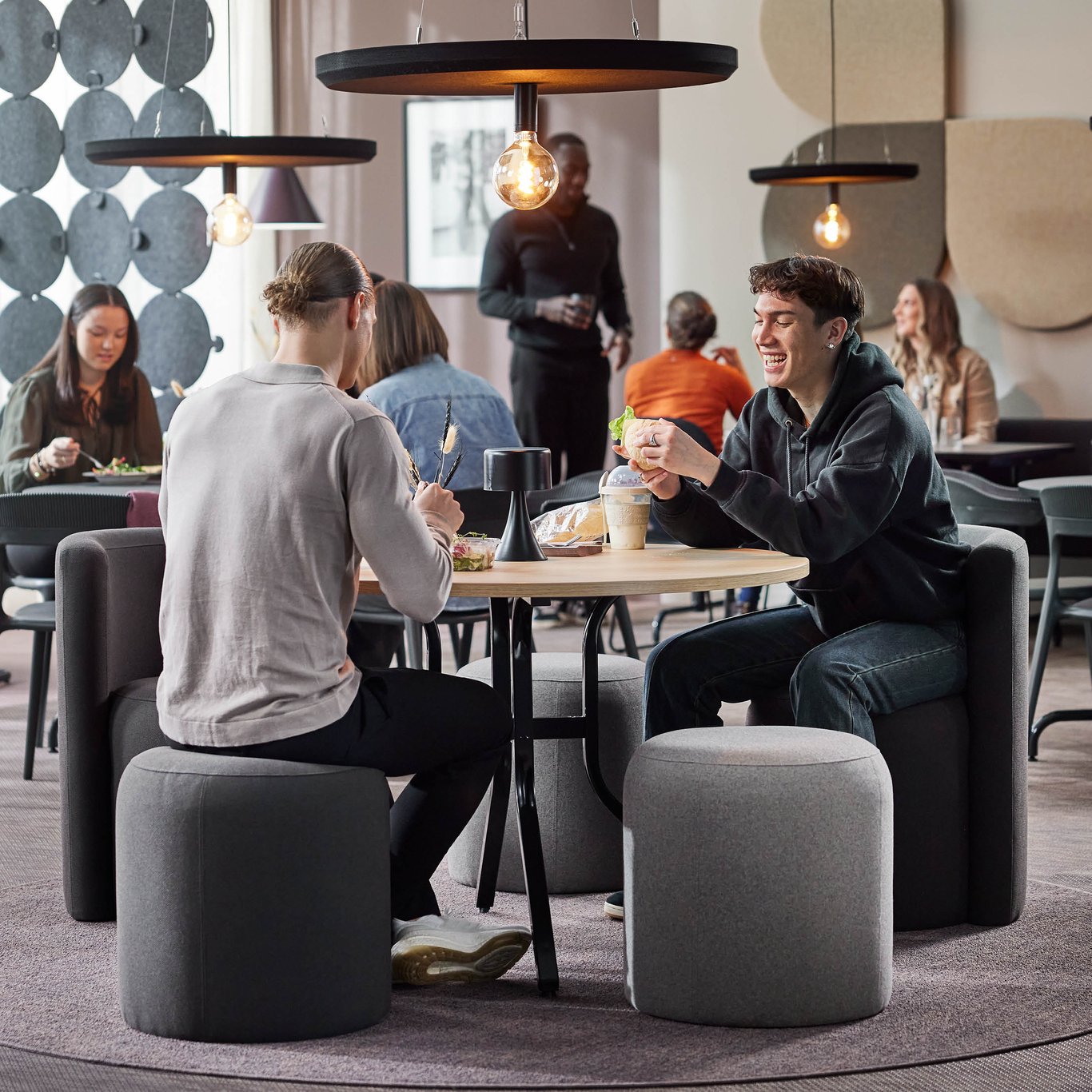 a busy canteen during lunch time, designed by AJ Products