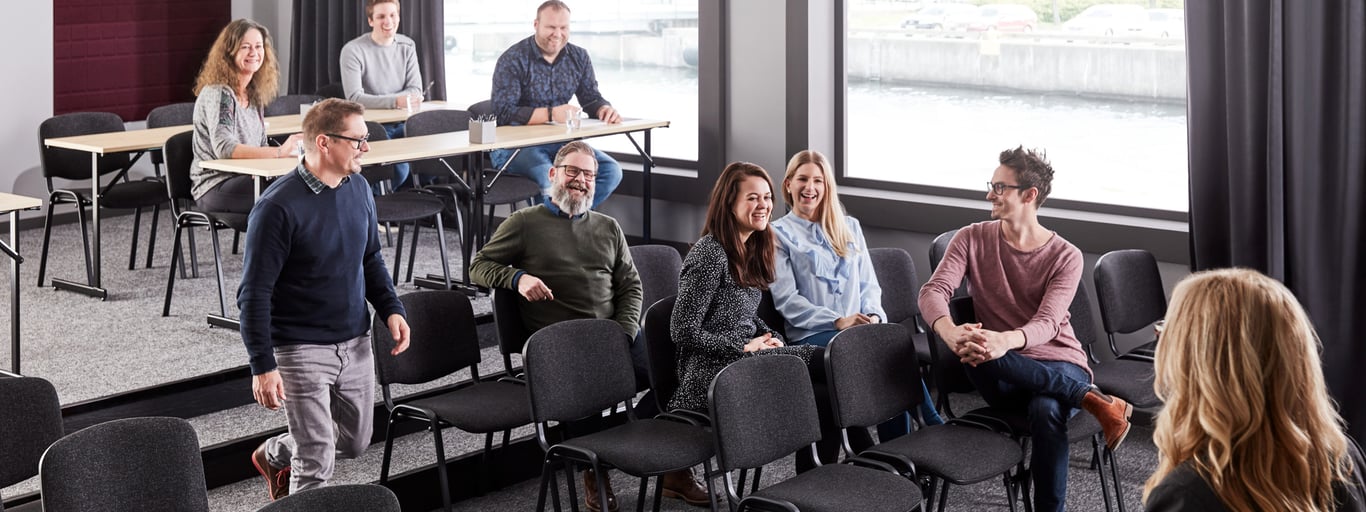 Colleagues gathering in conference room