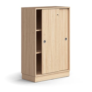 Lockable sliding door cabinet QBUS, 2 shelves, base frame, handles, 1252x800x400 mm, oak