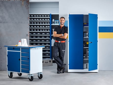 a person standing in a storage room with different storage furniture options