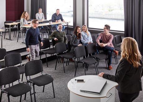 Colleagues gathering in conference room