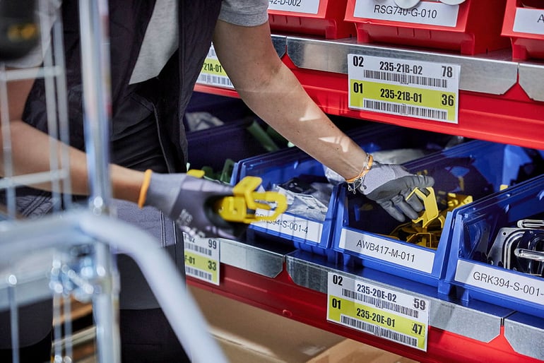 items organised in bins for effective picking in the warehouse