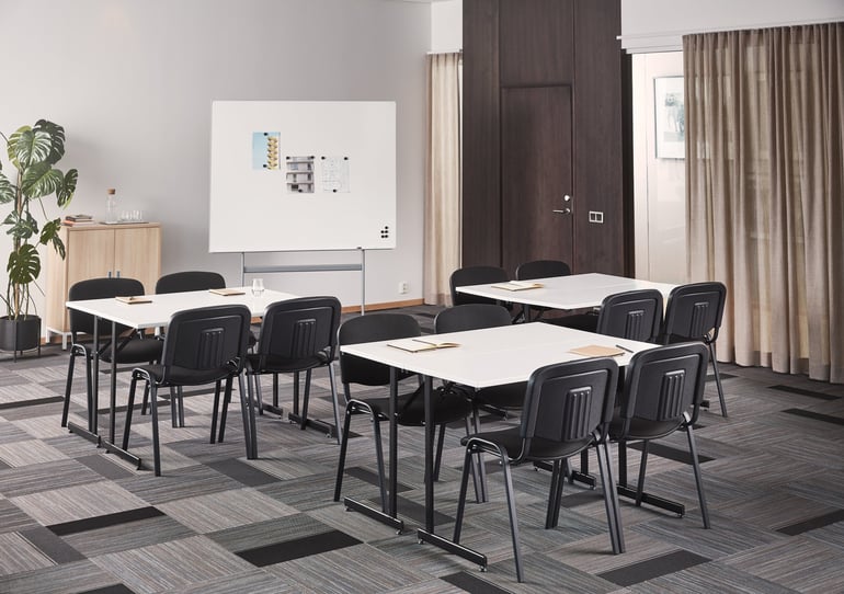 Cabaret-style meeting room layout chair and table distribution example
