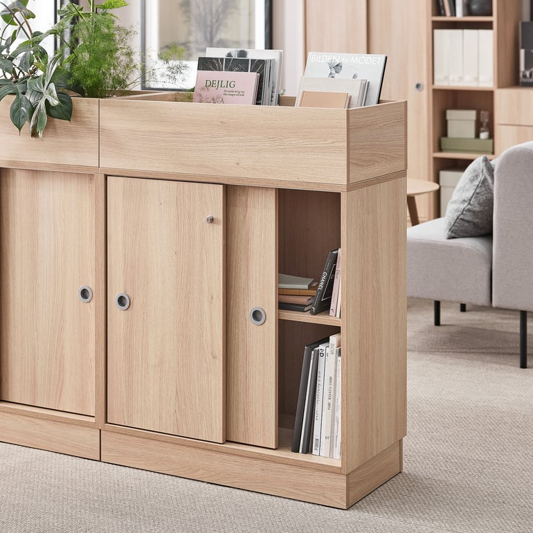 Space-saving, lockable storage cabinet with sliding doors designed by AJ Products