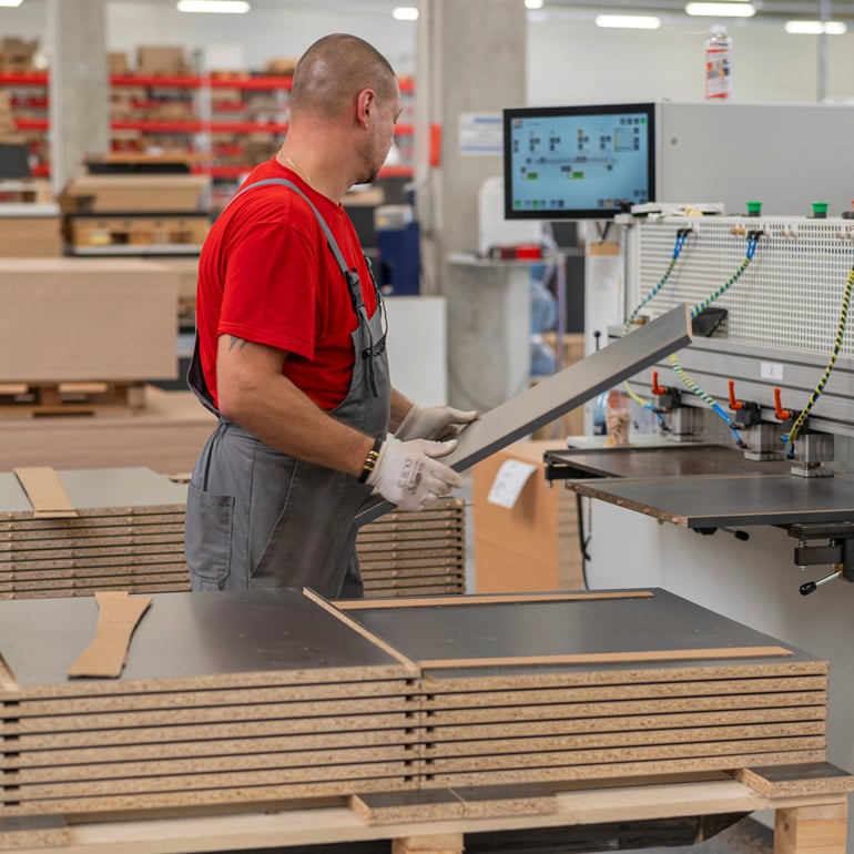 a factory worker focusing on his job
