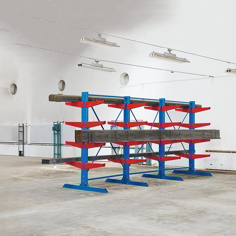 heavy duty cantilever racking unit, is a cantilever racking specifically designed for storing long heavy materials. The shelving unit is free-standing, with three shelves, and features supports to hold the load securely.