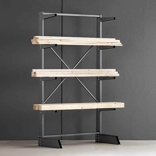 black metal cantilever shelving unit, is a cantilever racking specifically designed for storing long heavy materials. The shelving unit is free-standing, with three shelves, and features supports to hold the load securely.