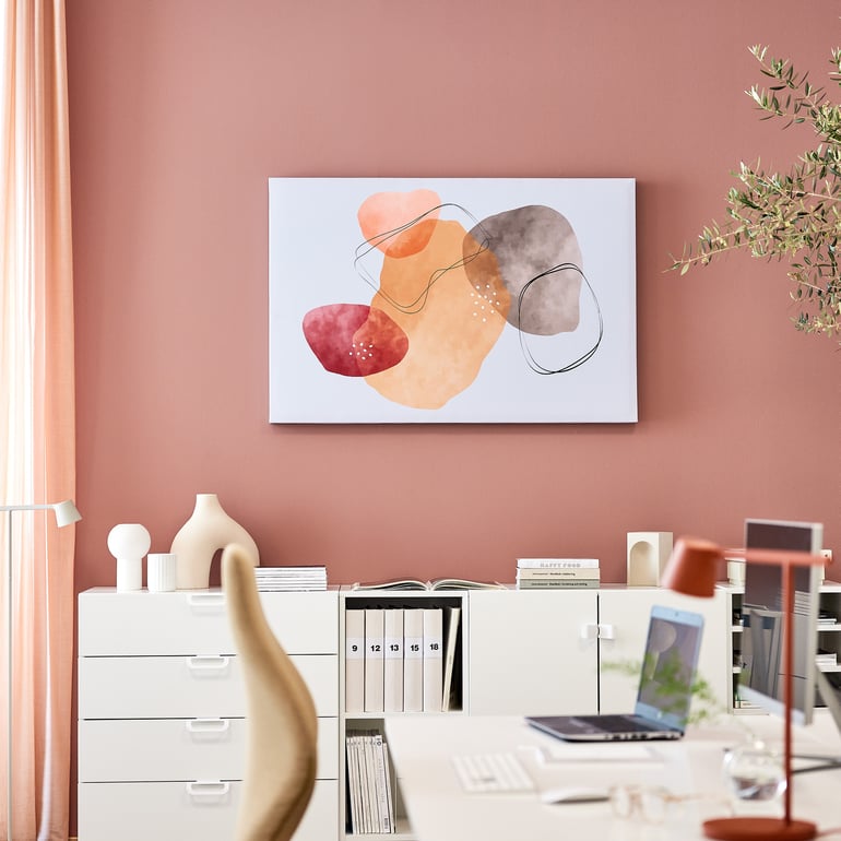 Acoustic panel IMAGE against a pink wall in an office