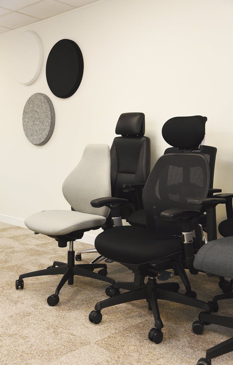 Ergonomic mesh and fabric office task chairs at the AJ Products office furniture showroom in Farnborough