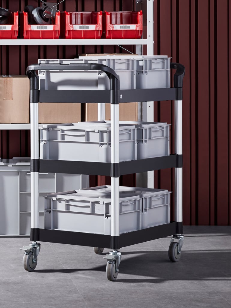 Shelf trolley packed with plastic crates