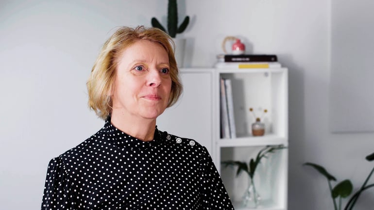 Woman being interviewed