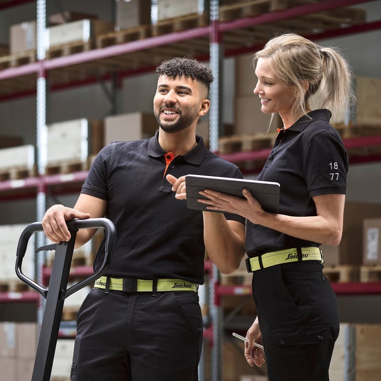 People talking in warehouse