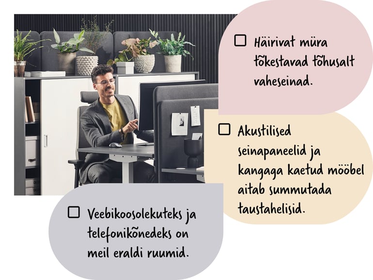 Inimene istub kontorilaua taga
