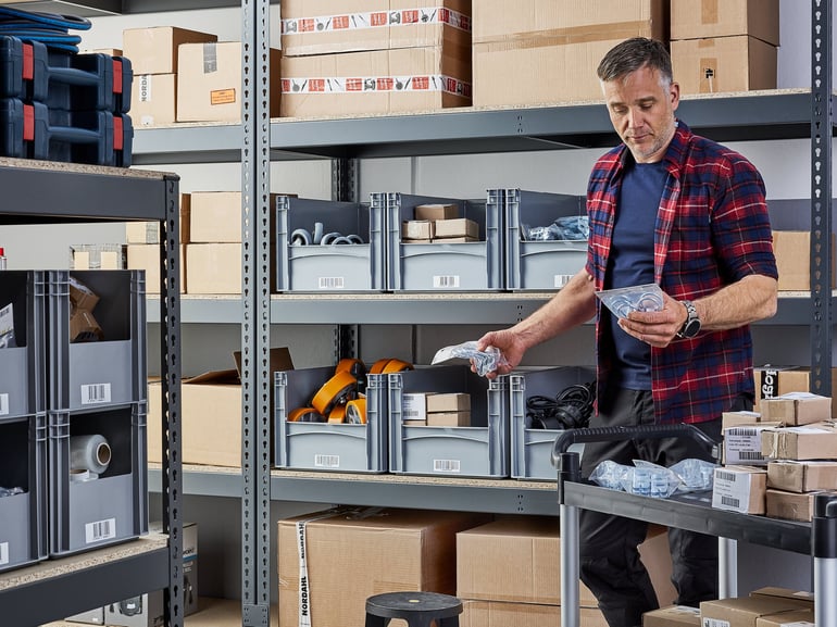 Man standing in a warehouse