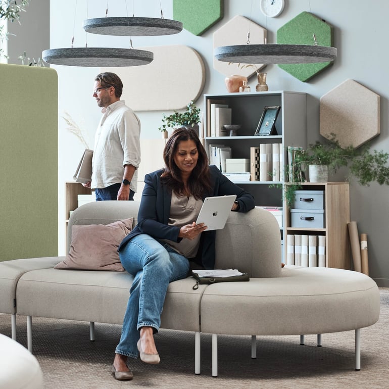 A person sitting on a sofa.