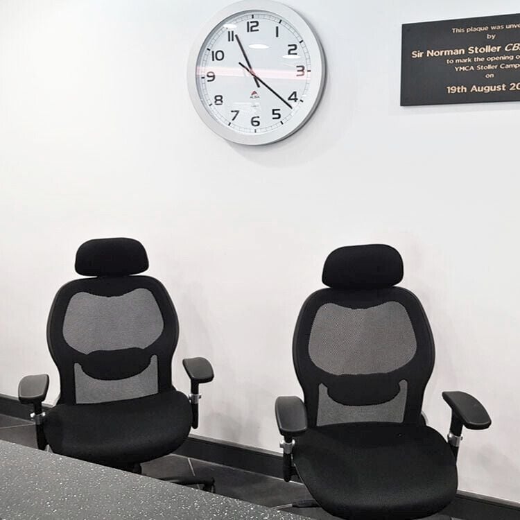 chairs and wall clock at YMCA