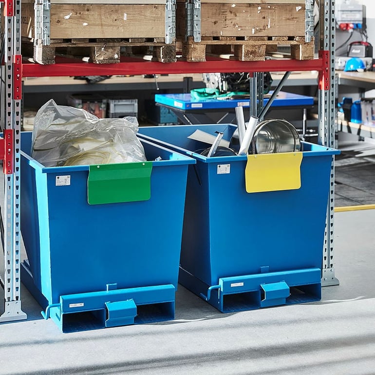 2 blue bins in a warehouse