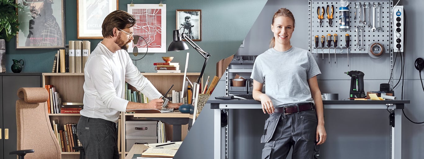 man standing at desk, woman standing at height-adjustable workstation