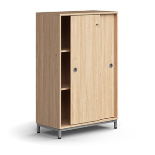 Lockable sliding door cabinet QBUS, 2 shelves, leg frame, handles, 1252x800x400 mm, silver, oak