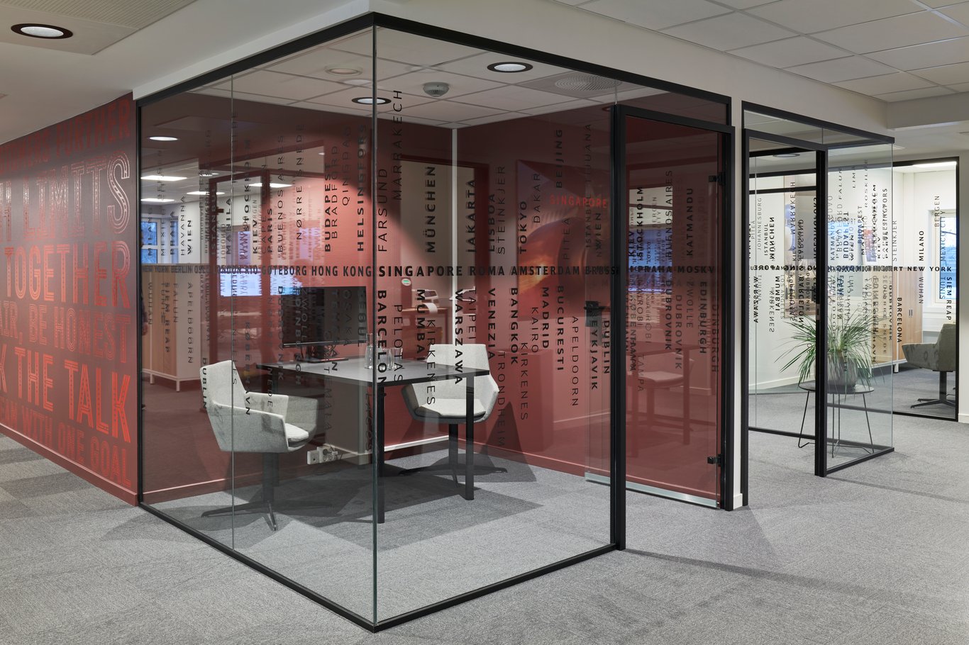 Small office meeting room with glass walls