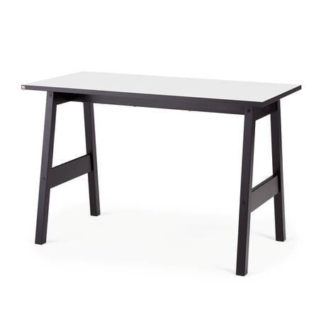 Majhna pisalna miza s črnim okvirjem in belim namizjem