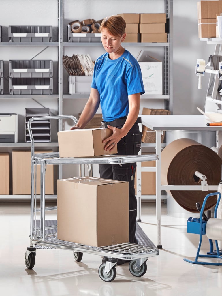 Man using picking trolley