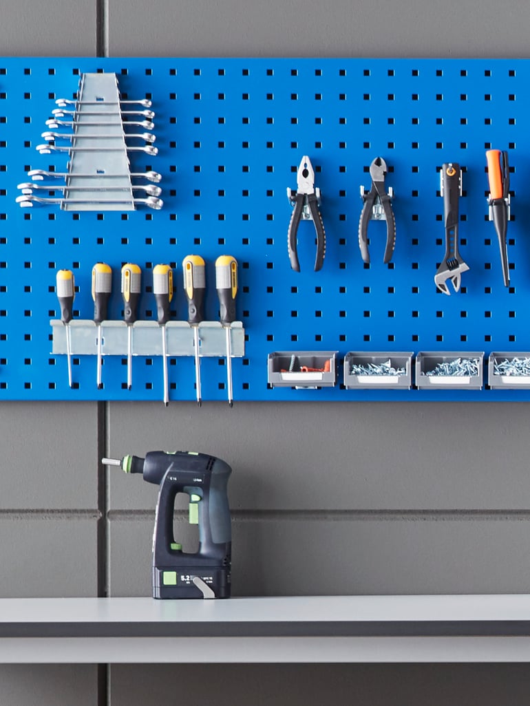 Wall mounted tool panels with tools