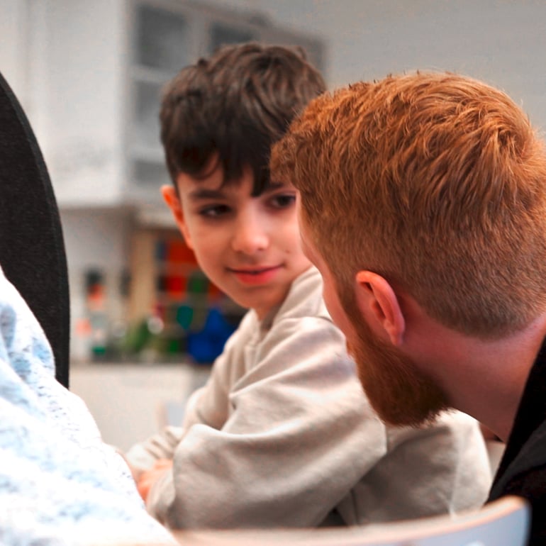 Teacher talking to a student 