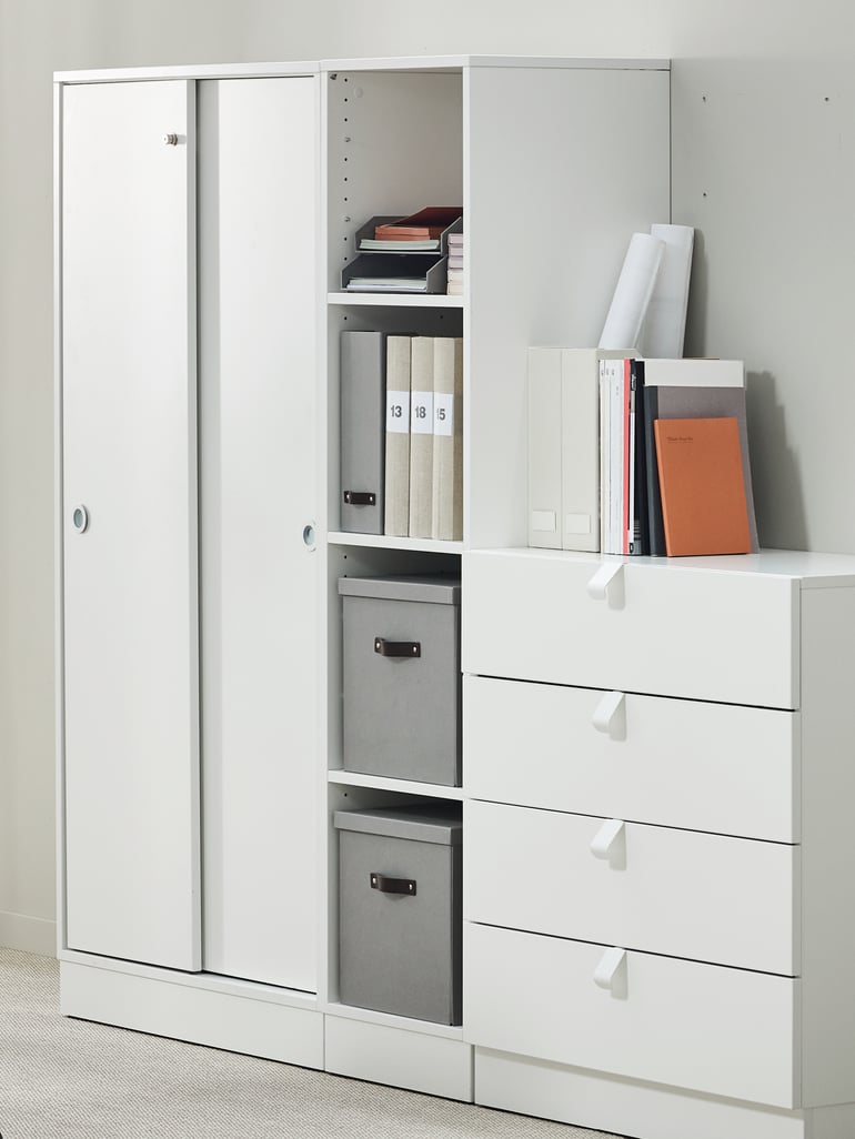 QBUS storage showing a tall cabinet with shelves and a drawer storage unit