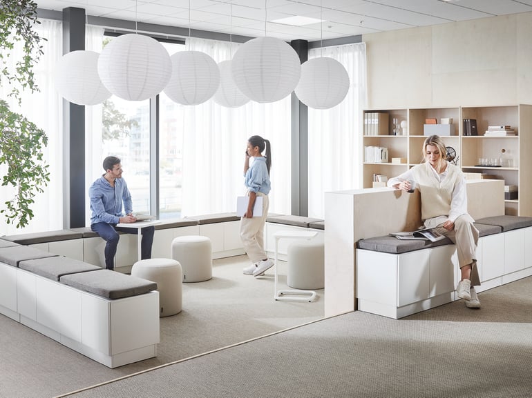 Open plan office with white office furniture