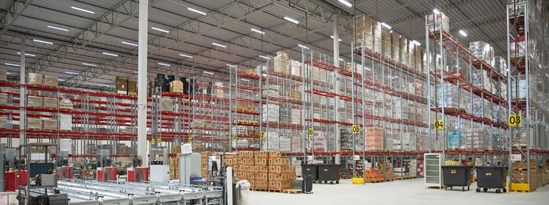 Warehouse aisles with floor to ceiling pallet racking